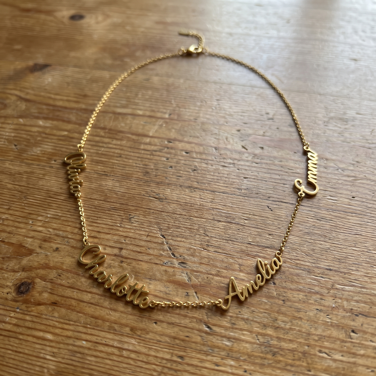 KALYS necklace laid out on a table