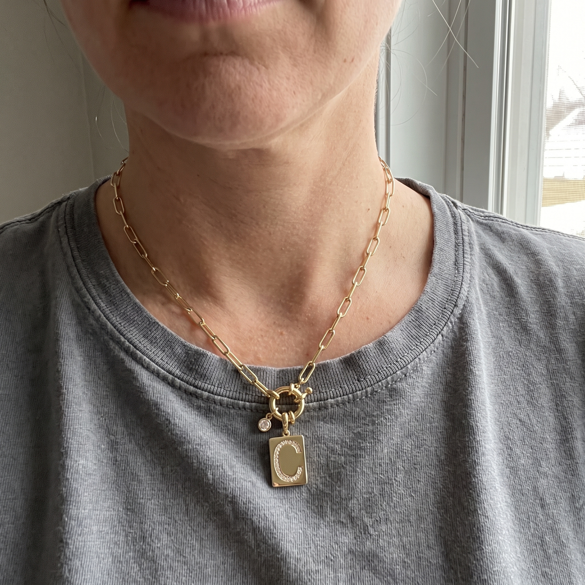 PAVE initial necklace worn