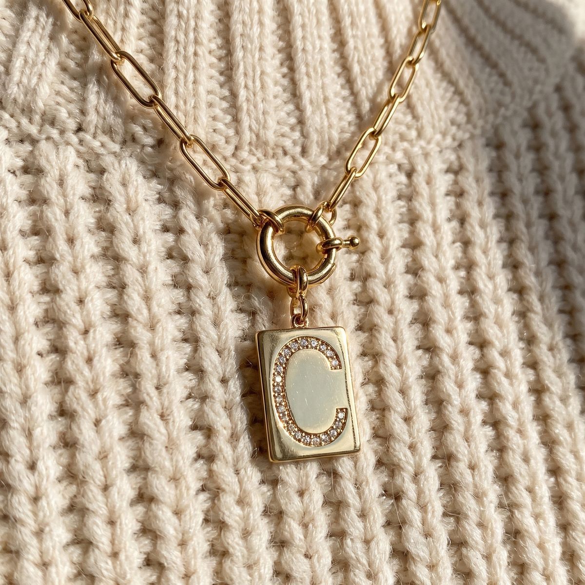 PAVE initial pendant close-up